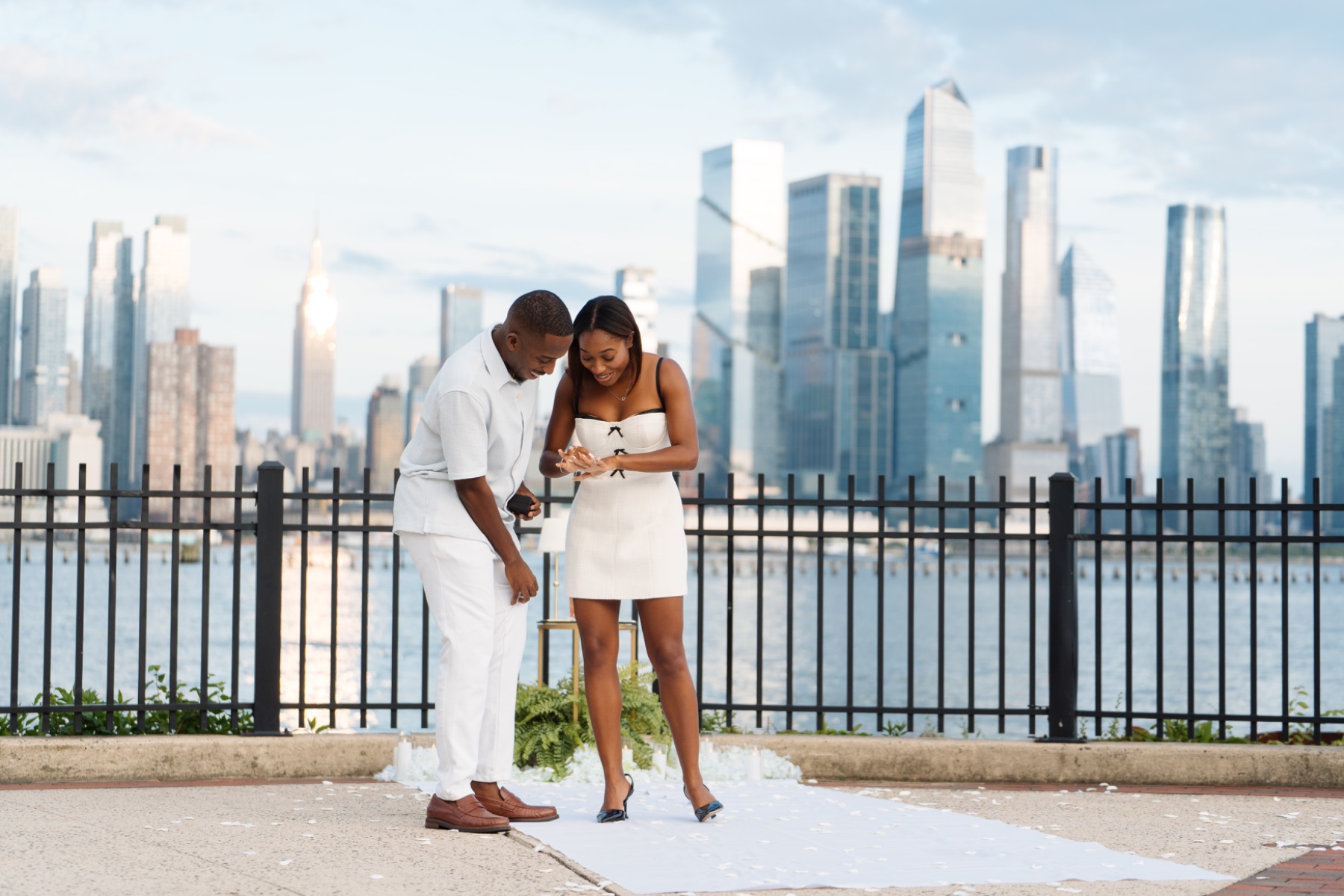 Couple admiring the engagement ring